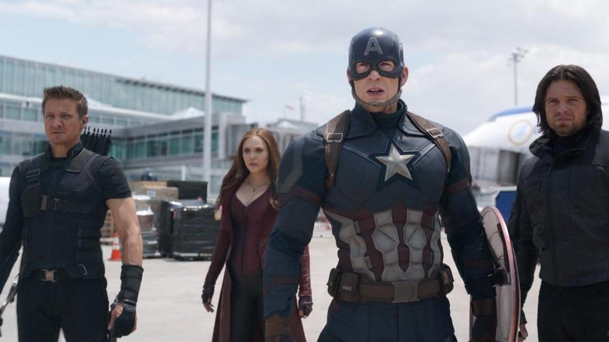 Hawkeye (Jeremy Renner), Scarlet Witch (Elizabeth Olsen), Captain America (Chris Evans) and Winter Soldier (Sebastian Stan) prepare for battle in ‘Captain America: Civil War.’