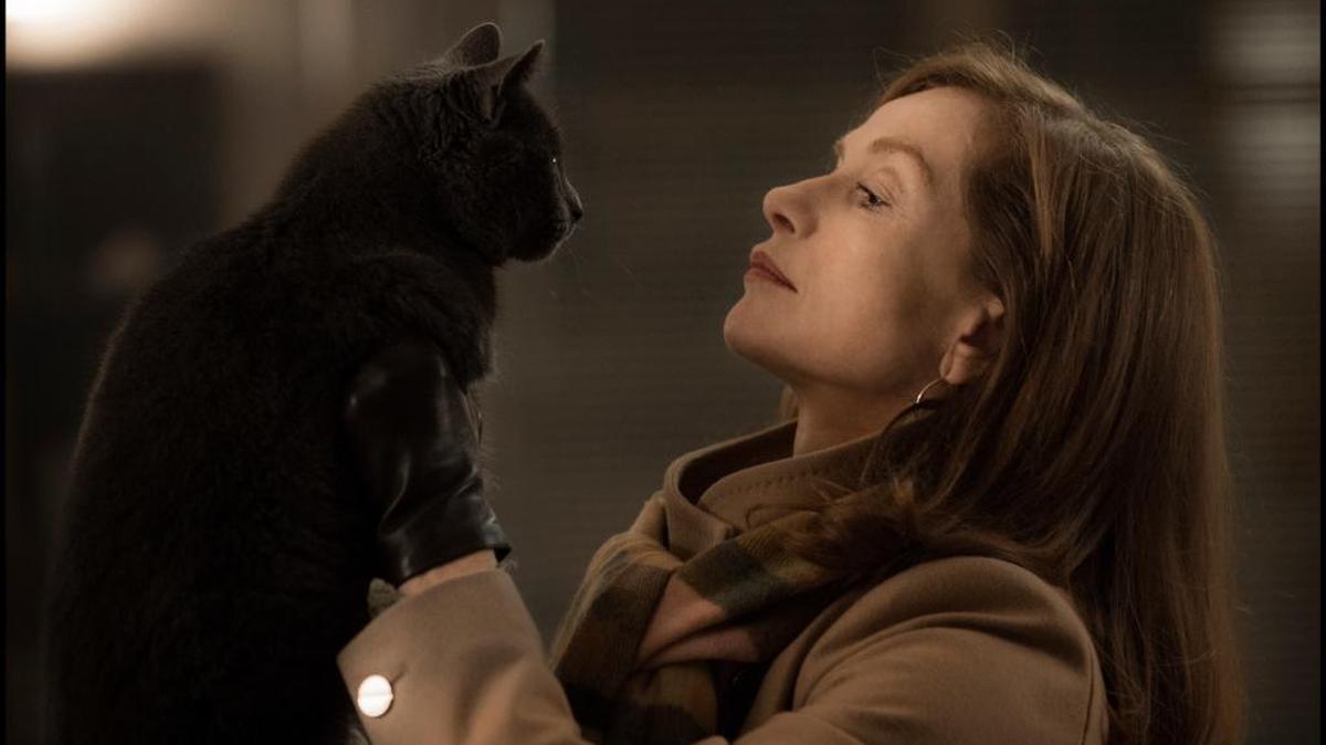 Isabelle Huppert stars as a video game designer searching for the man who assaulted her in ‘Elle.’
