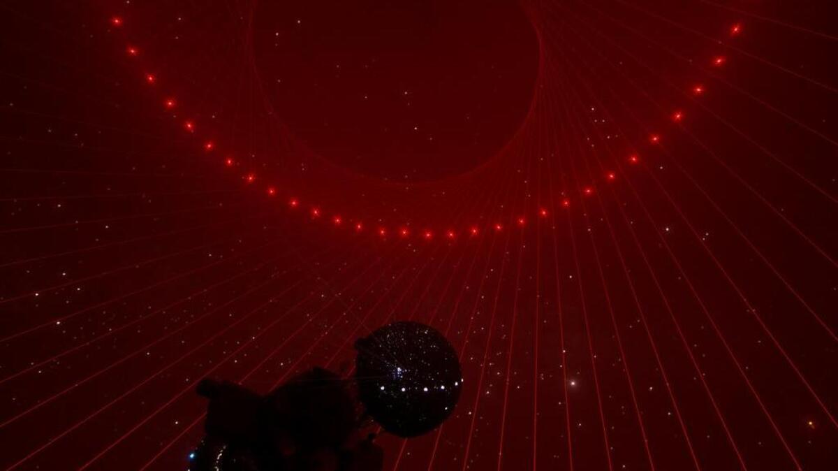 
SATURDAY: Artist Matthew Schreiber’s laser installation inside the Frost Museum of Science Planetarium will be activated during the first Science Art Cinema event.
