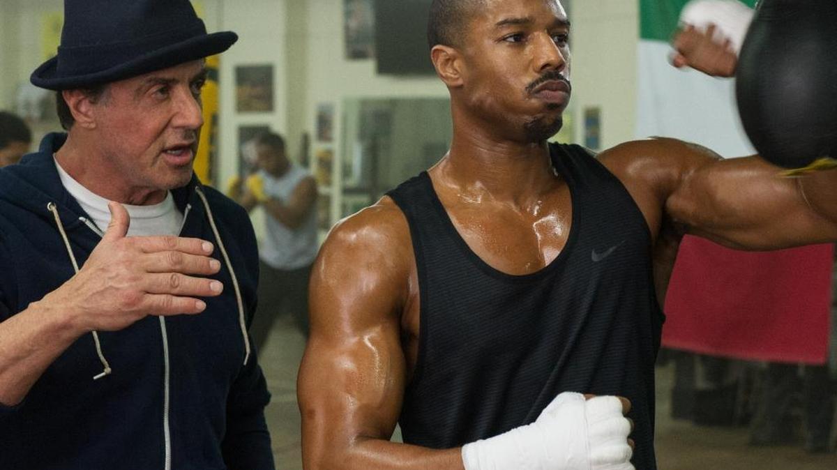 Sylvester Stallone coaches Michael B. Jordan in a scene from ‘Creed.’