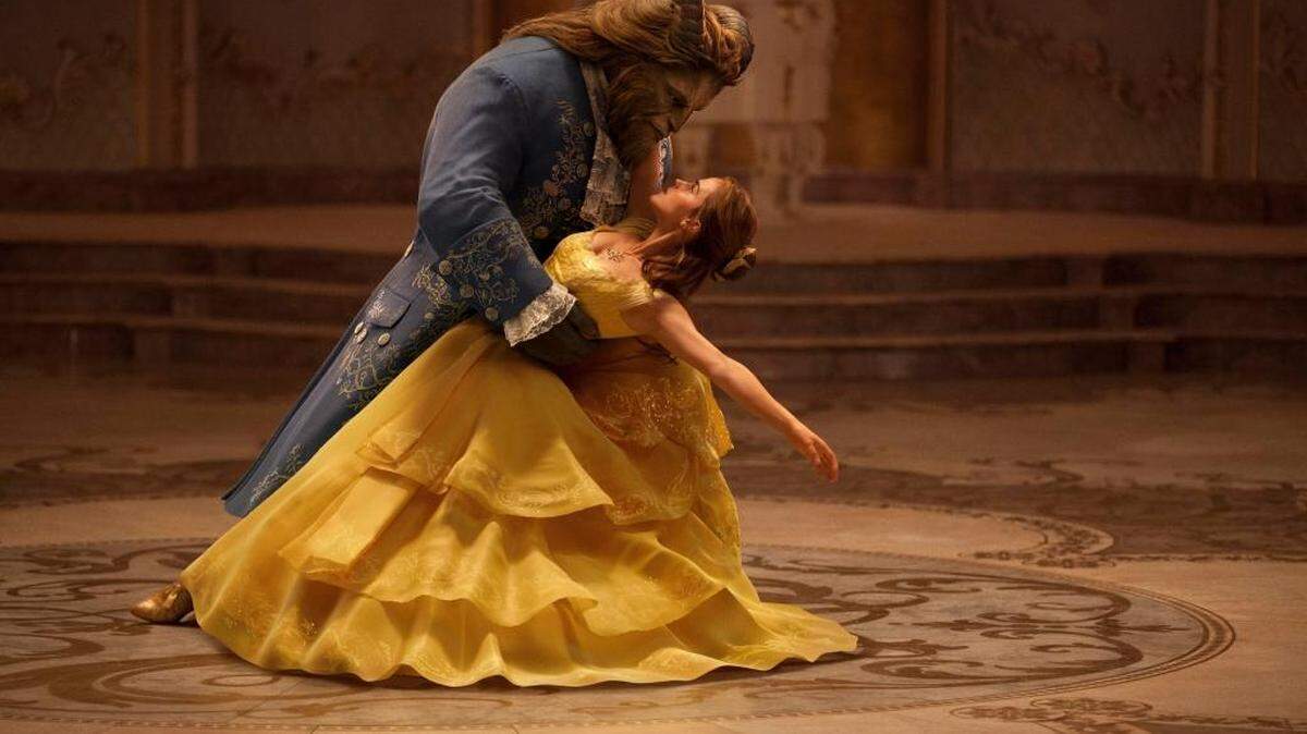 Belle (Emma Watson) and the Beast (Dan Stevens) share a dance in a scene from ‘Beauty and the Beast.’