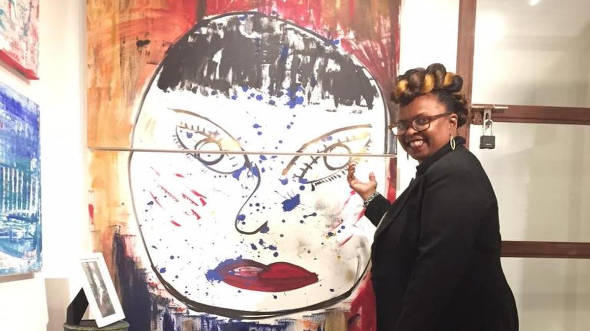 Singer Betty Wright with her painting ‘Asia Moon,’ on display at KROMA Art Space and Studios in Coconut Grove.
