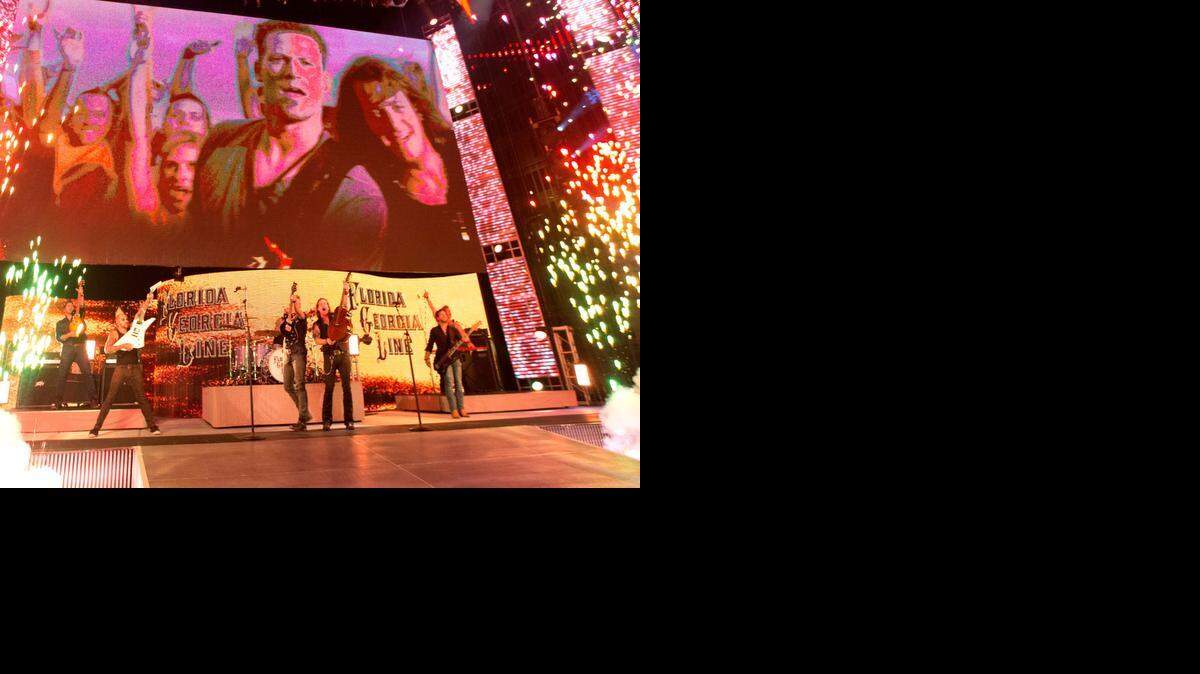 
Whether it’s for Monday Night Raw or Tribute to the Troops, country music duo Florida Georgia Line enjoys performing at WWE events. Florida Georgia Line will join WWE Superstars and Divas to honor the United States Armed Forces during the 12th annual WWE holiday special, Tribute to the Troops, which will air on USA Network as a part of “WWE WEEK” at 8-10 p.m. EST Wednesday, Dec. 17 and will re-air as a one-hour special on NBC 8-9 p.m. EST Saturday, Dec. 27.

