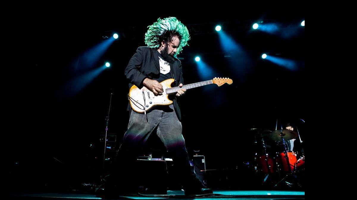 
PERDOMO ROCKS: Musician Fernando Perdomo rocks on lead guitar for a diverse group of artists, including classic rock artist Todd Rundgren and Latin musicians Tego Calderón and Christian Castro. Perdomo’s arts awakening was cemented at music class at Miami Beach Senior High. 
