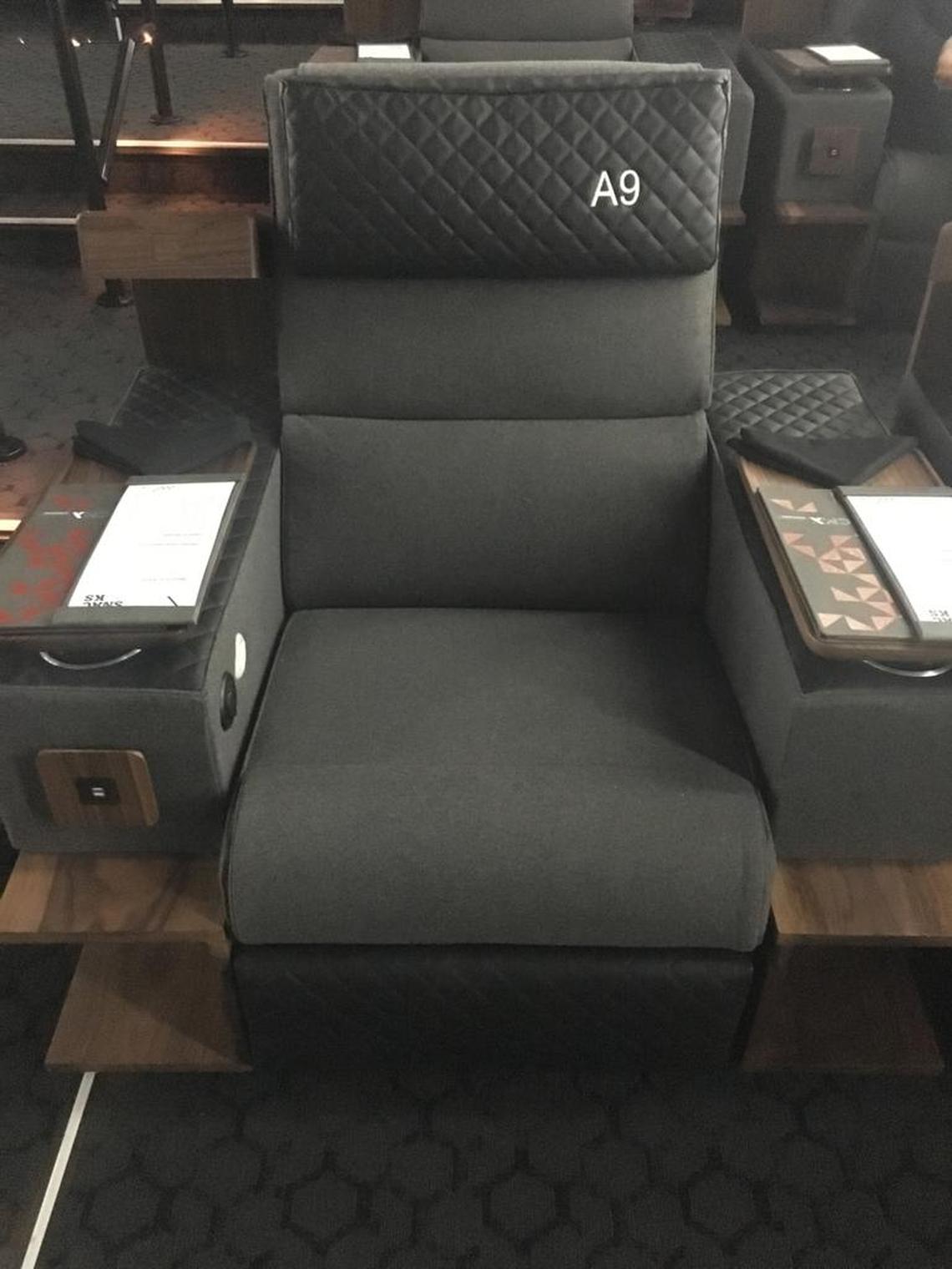 You can order food and drink from a button on the arm of your seat or via CMX’s app.