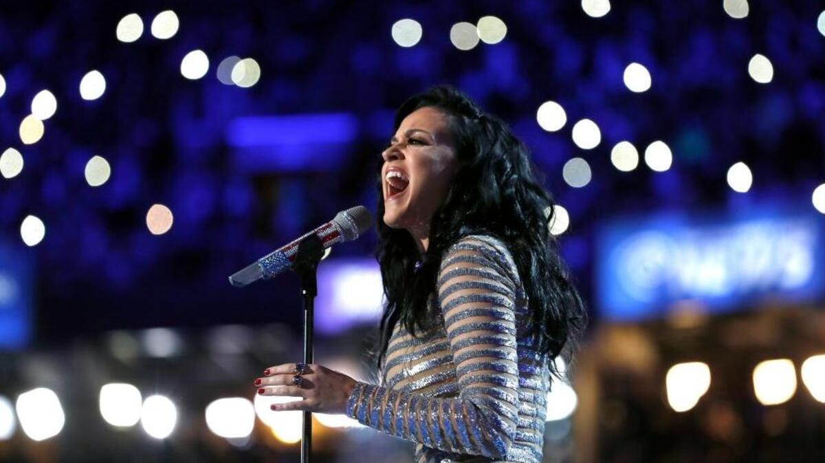 Pop star Katy Perry, seen here performing at the Democratic National Convention last July, is among the famous names joining inauguration protest events this weekend.
