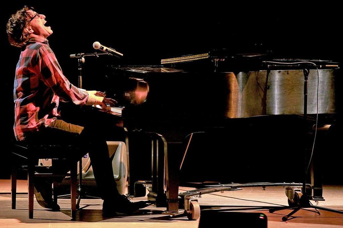 Clark Douglas Burris’ former student, Adam Chester, performs Elton John’s “Funeral for a Friend/Love Lies Bleeding” during a remembrance concert on Feb. 21, 2016. On that Sunday, Beach High students and alums gathered to celebrate one of South Florida’s favorite music teachers, Burris, who had recently died, with the musical celebration of his life called “Rockin’ the Universe” at Miami Beach High auditorium. Chester has been Elton John’s rehearsal pianist since 2005.
