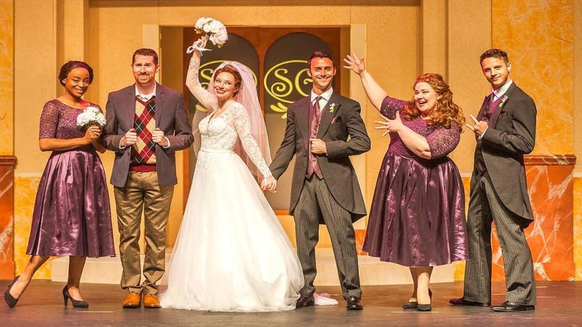 Gabrielle Graham, Tim Dolan, Erica Lustig, Taylor Hilt Mitchell, Cindy Pearce and Alexander Zenoz strike a wedding pose in the Actors’ Playhouse production of ‘It Shoulda Been You.’