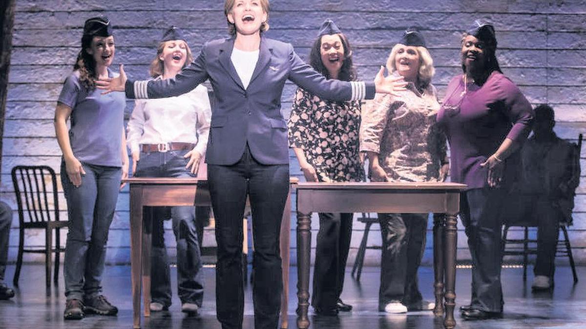 Becky Gulsvig, front, conveys the deep love of flying central to the life of American Airlines pilot Beverley Bass in the touring production of ‘Come From Away’ at Miami’s Arsht Center.