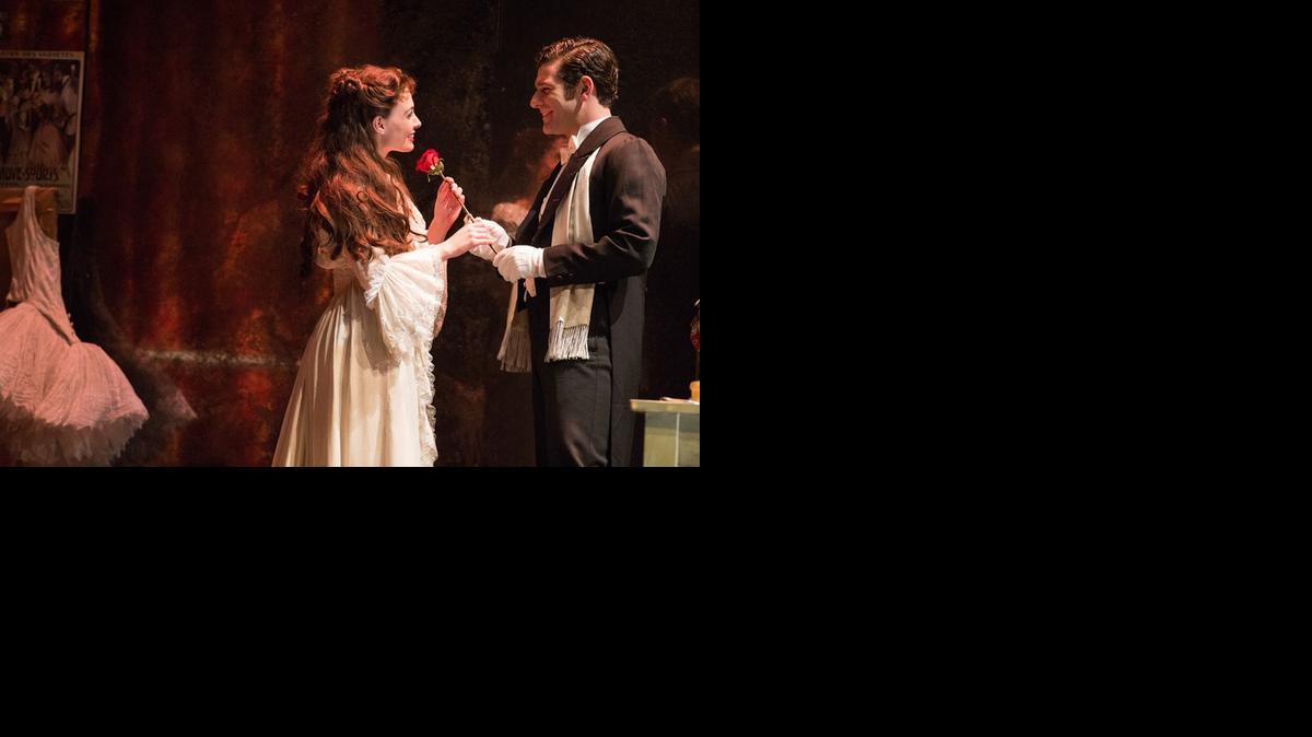 
Julia Udine’s Christine is wooed by Ben Jacoby’s Raoul in ‘Phantom of the Opera’ at the Broward Center.
