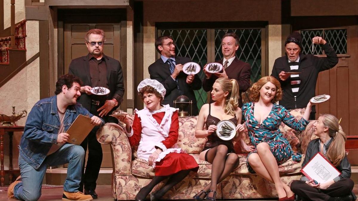 The ladies and gents of Michael Frayn’s ‘Noises Off’ strike a pose in the Actors’ Playhouse farce at the Miracle Theatre in Coral Gables.