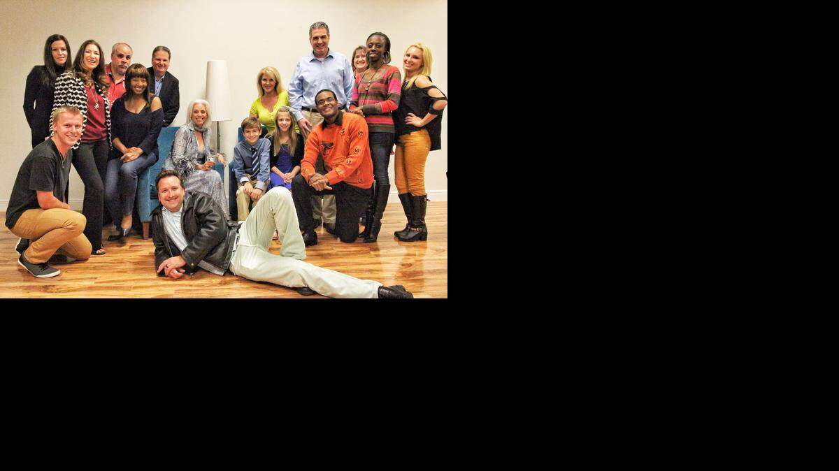 
Tony Larkin (in orange sweater), and the cast of 'The Life Exchange' : Far left, from the rear: Karina Vardoulias, Mireya Kilmon, Elliott Schertzer, Tommy O'Brien, Nicole Denise Hodges and Chris Easey (kneeling) Far right, from the Left: Carole Wood (star of movie, yellow blouse) Brian McCormack, Karen Gill (back row) Carol Munroe Jenna Newhart (far right) Center: Marilyn Carlisle (seated), Demitri Vardoulias (little boy), Megan Lynn Gill (little girl) Jerome-Anthony Larkin, Scott J. King (posing center)
