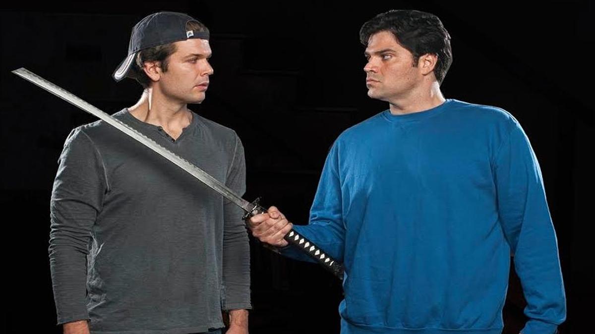 Taylor Miller (left) is threatened by Alex Alvarez in GableStage’s ‘Stalking the Bogeyman.’