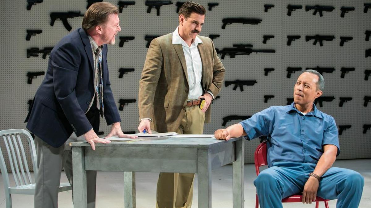 Stephen G. Anthony as Sergeant Singleton and Nicholas Richberg as Lieutenant Diaz work to get information from Yancey Arias as Jorge ‘Rivi’ Ayala in the Miami New Drama world premiere of ‘Confessions of a Cocaine Cowboy.’