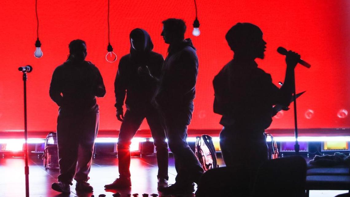 The cast of ‘Trigger’ rehearses for the show’s premiere at the Moss Center at Virginia Tech University, where in 2007 a gunman killed 32 people. At the Miami-Dade College show Friday, local performers will add their own encounters with gun violence.
