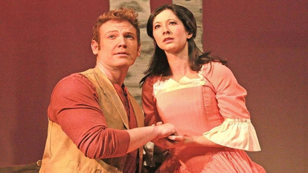 Michael Hunsaker as Billy woos Julie Kleiner as Julie in the Actors’ Playhouse production of ‘Carousel.’