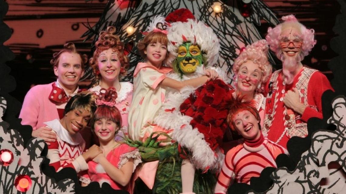 Stefan Karl as The Grinch is surrounded by the citizens of Whoville in ‘How the Grinch Stole Christmas.’
