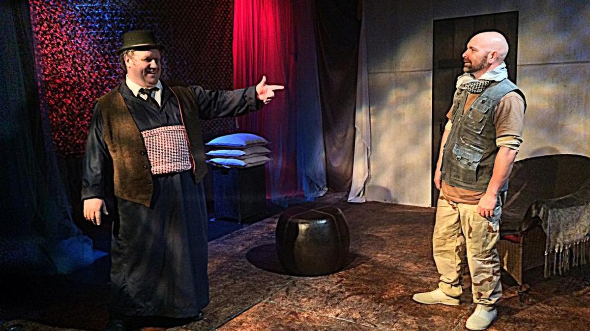 
Ken Clement welcomes a wary Andy Quiroga into his abode in Mad Cat’s world premiere of Theo Reyna’s ‘Lazy Fair.’

