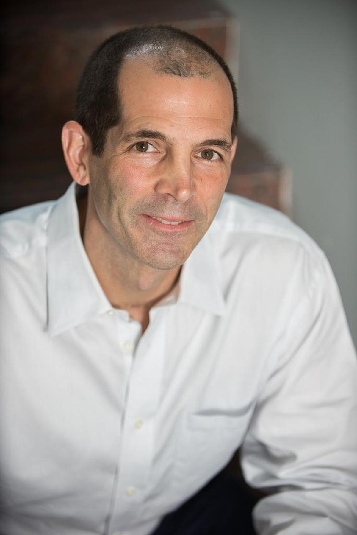 Miami playwright and lawyer Christopher Demos-Brown.