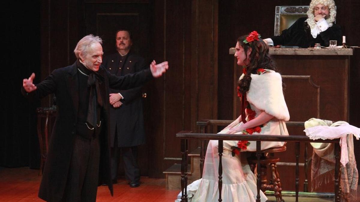 Kevin Reilley as Scrooge questions Lindsey Corey as Belle in ‘The Trial of Ebenezer Scrooge.’
