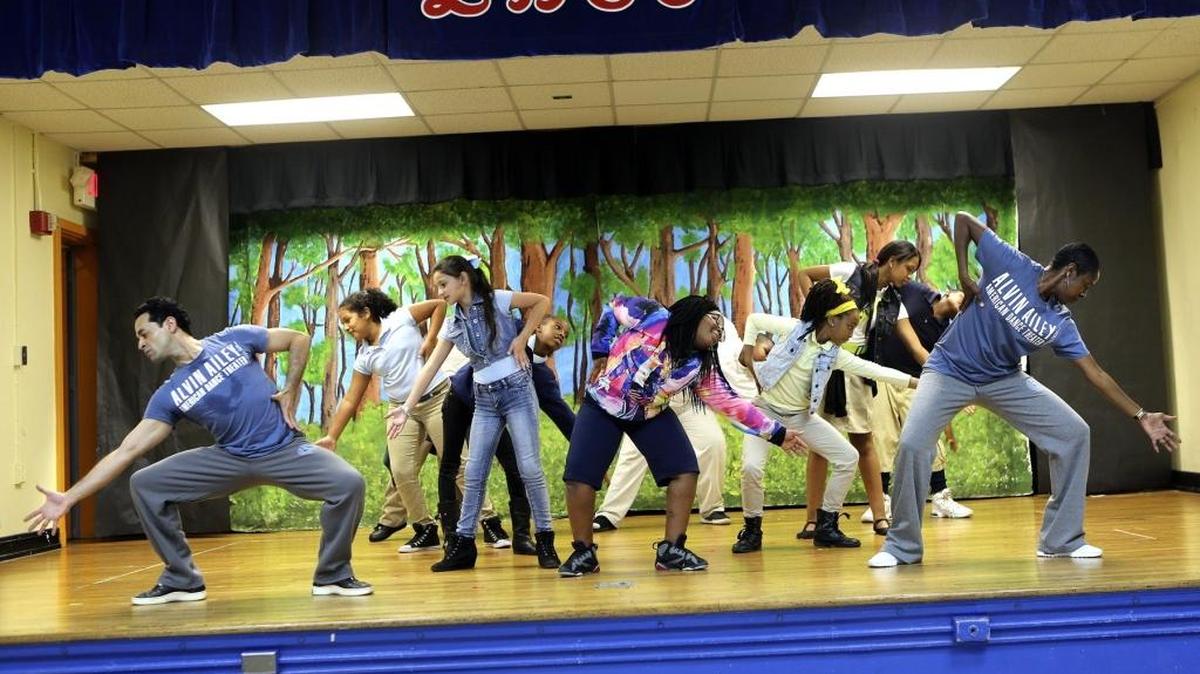 Ja'Niya Williams, center, joins other Lenora B. Smith Elementary School fifth-graders in performing an excerpt from Alvin Ailey’s masterpiece ‘Revelations’ on Thursday, Feb. 11, 2016 at the Miami school.