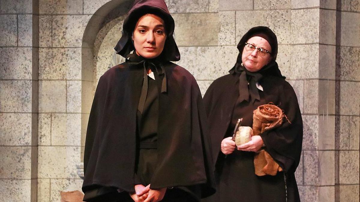 Jessica Sanford as Sister James is counseled by Laura Turnbull as Sister Aloysius in ‘Doubt’ at Actors’ Playhouse.