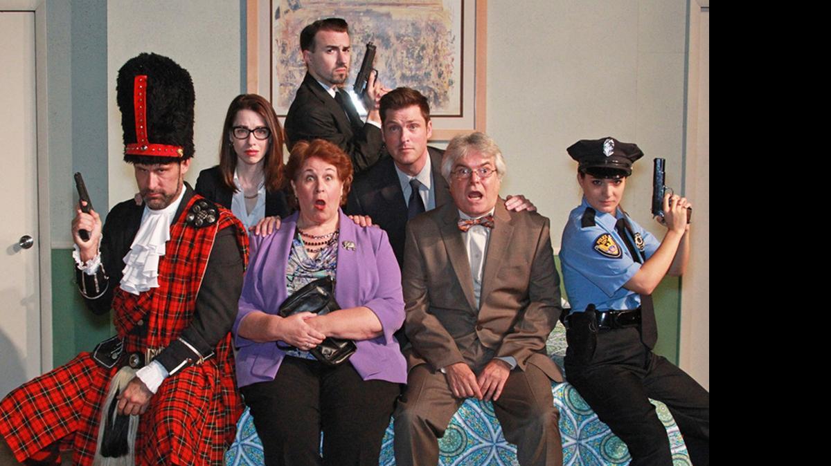 
The farceurs in ‘Unnecessary Farce’ at Actors’ Playhouse are (clockwise from left) Jim Ballard, Katherine Amadeo, Cliff Burgess, Chris Craword, Jessica Brooke Sanford, Allan Baker and Elizabeth Dimon.

