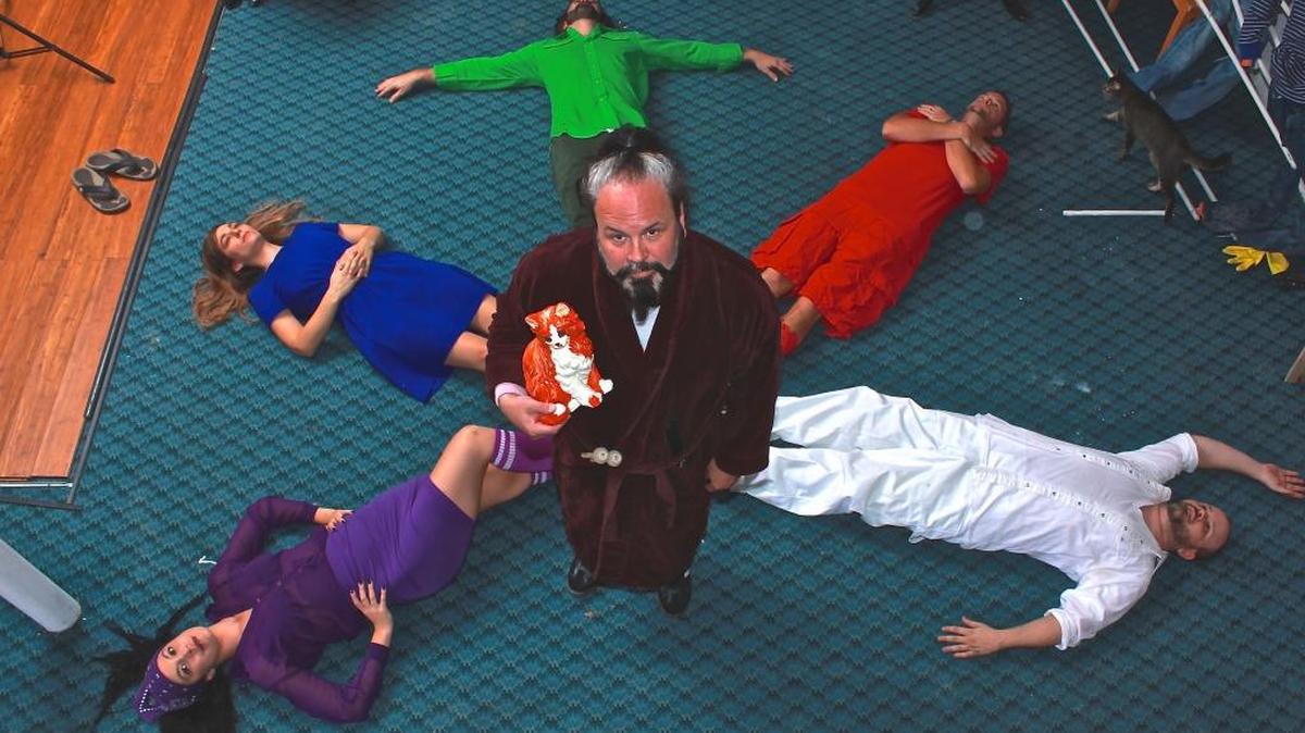 Mad Cat artistic director Paul Tei takes a break with his band mates as they rehearse for their concert version of Harry Nilsson’s ‘The Point.’