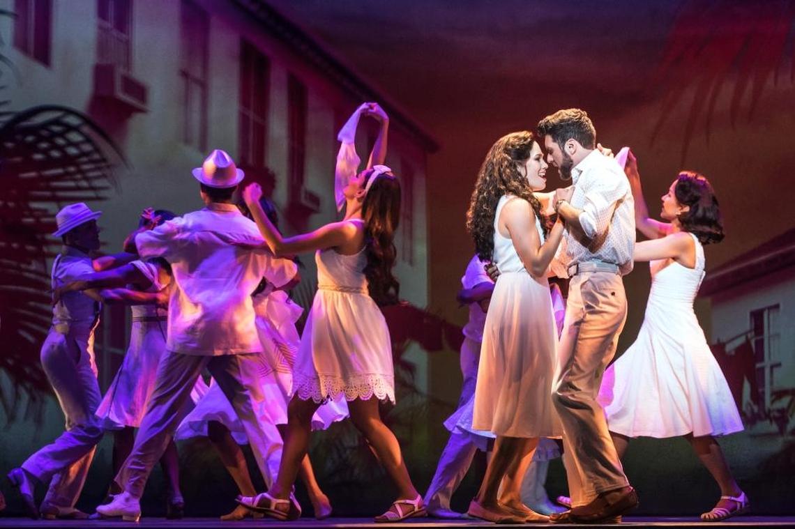 Christie Prades as Gloria Estefan makes a connection with Mauricio Martinez as Emilio Estefan in “On Your Feet!” at the Arsht Center.