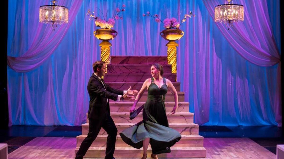 Caleb Scott and Lindsey Corey make like Fred and Ginger in the Zoetic Stage production of “Dancing Lessons” at the Arsht Center.