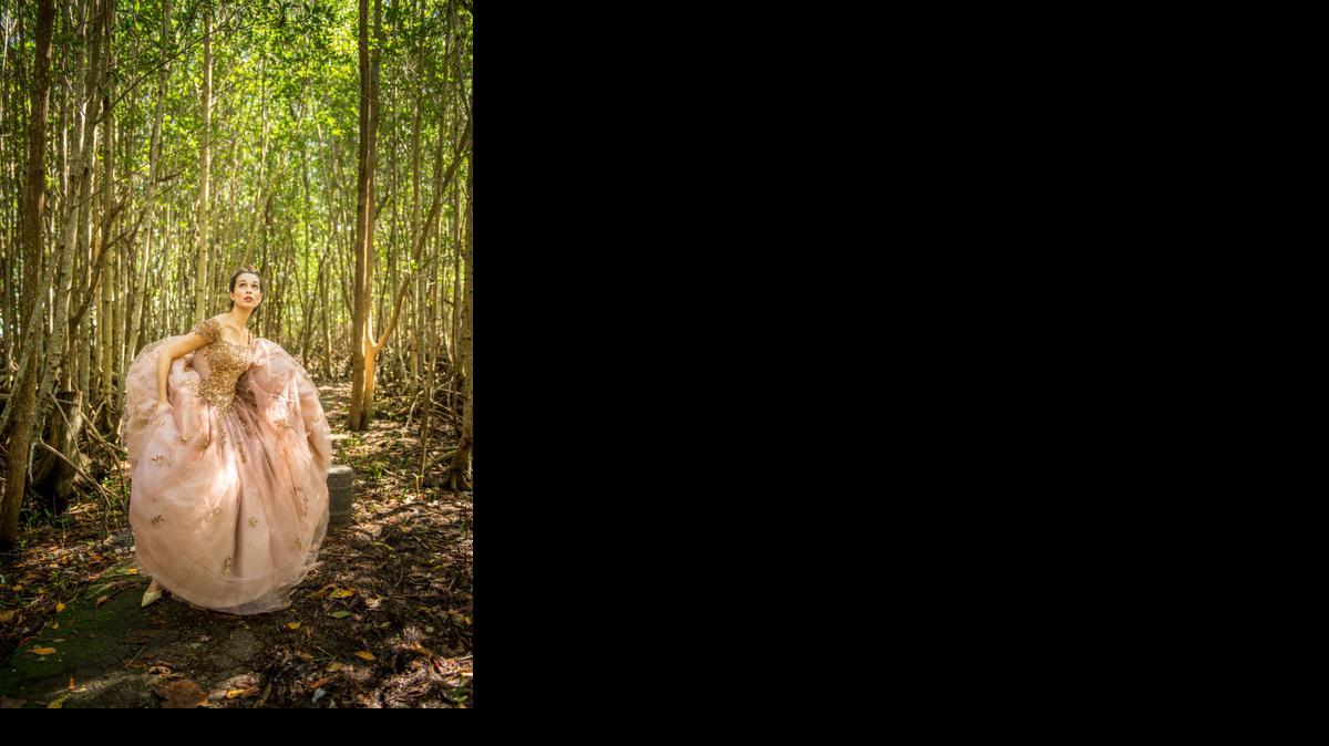 
Annemarie Rosano as Cinderella dashes through the woods in DreamCatcher Theatre’s ‘Into the Woods’ at the Arsht Center.

