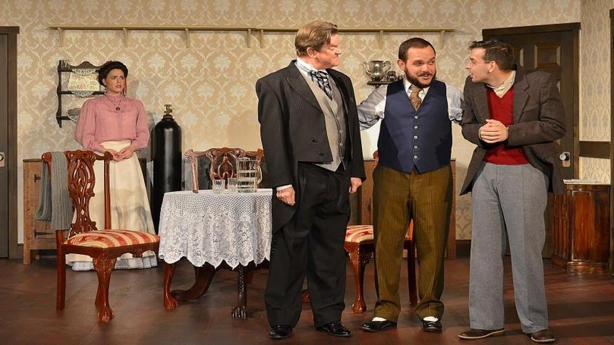 Sheri Weiseman is aghast as Stephen Chambers, Michael Fernandez and Anthony Wolff confer in “The Underpants” at Main Street Playhouse.