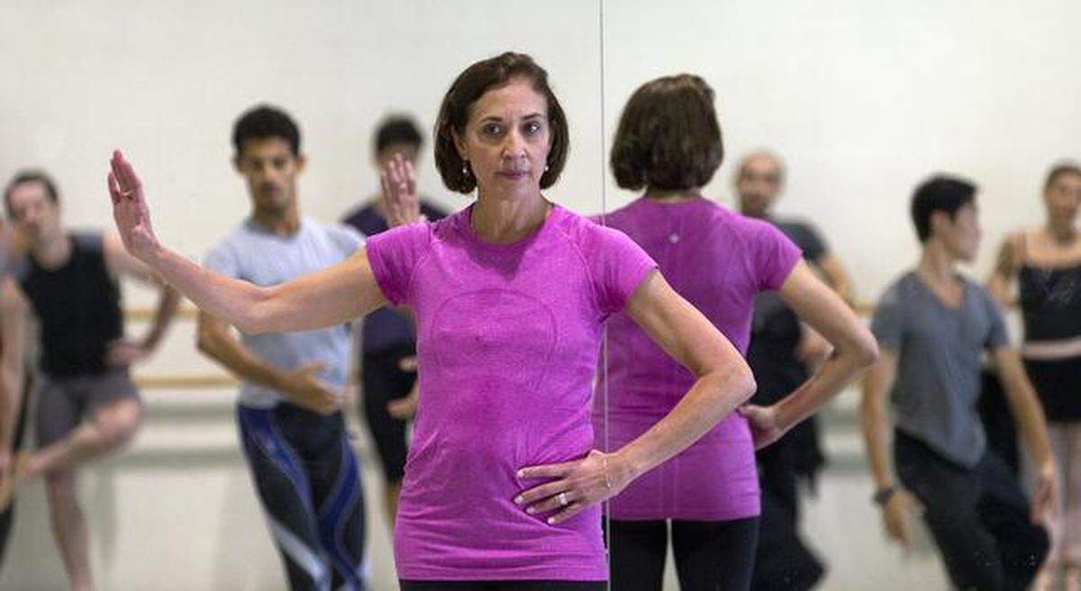 Miami City Ballet artistic director Lourdes Lopez (in pink) teaches a company class on Wednesday, Aug. 6, 2014.