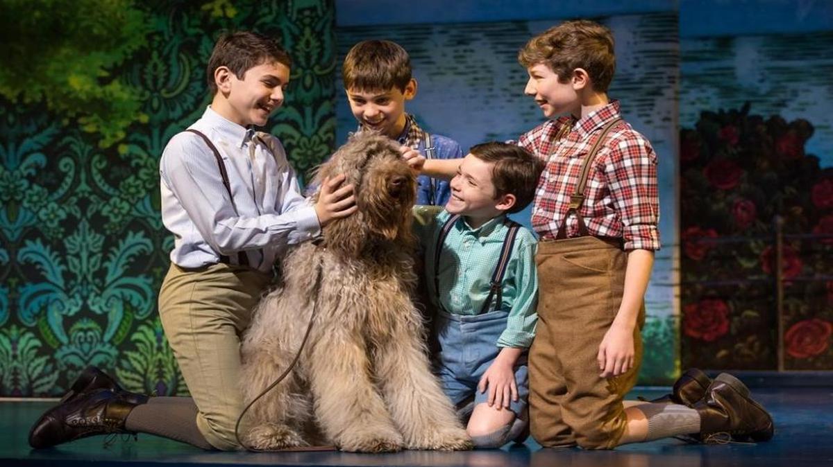 Ben Krieger, Colin Wheeler, Tyler Patrick Hennessy and Finn Faulconer and the furry well-trained Sammy in ‘Finding Neverland.’