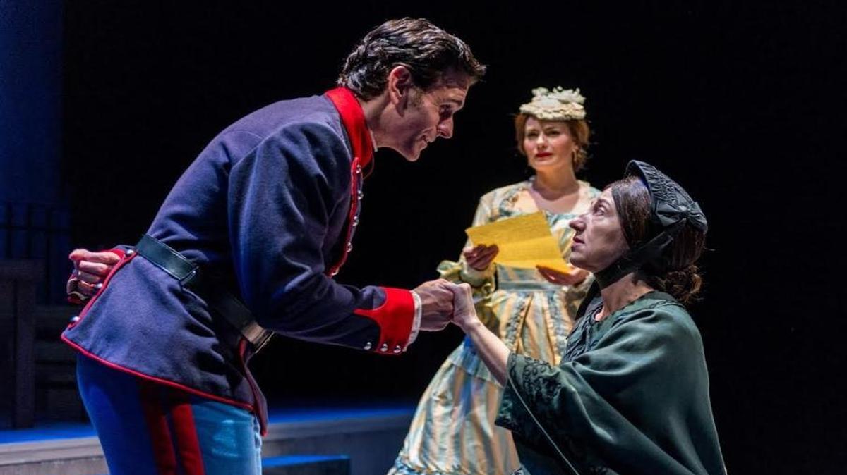 Giorgio (Nicholas Richberg) is courtly with Fosca (Jeni Hacker) as Clara (Anna Lise Jensen) ponders his love letter in Zoetic Stage’s ‘Passion.’