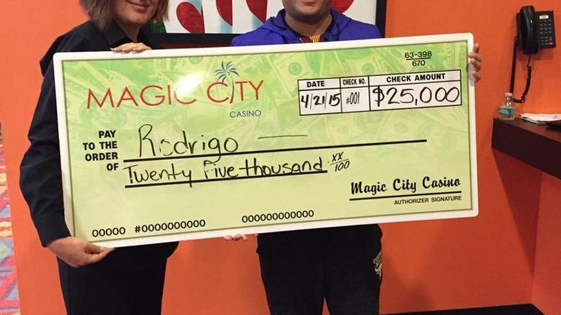 Rodrigo Rodriguez won $25,000 after dealer Maya Auciello, left, turned over an ace, king, queen, jack and nine at Magic City Casino.