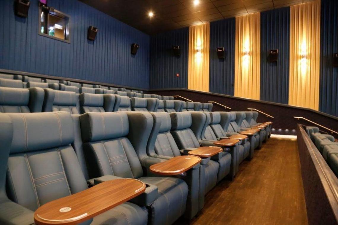 The seat trays at CineBistro are sturdy enough for actually cutting food.