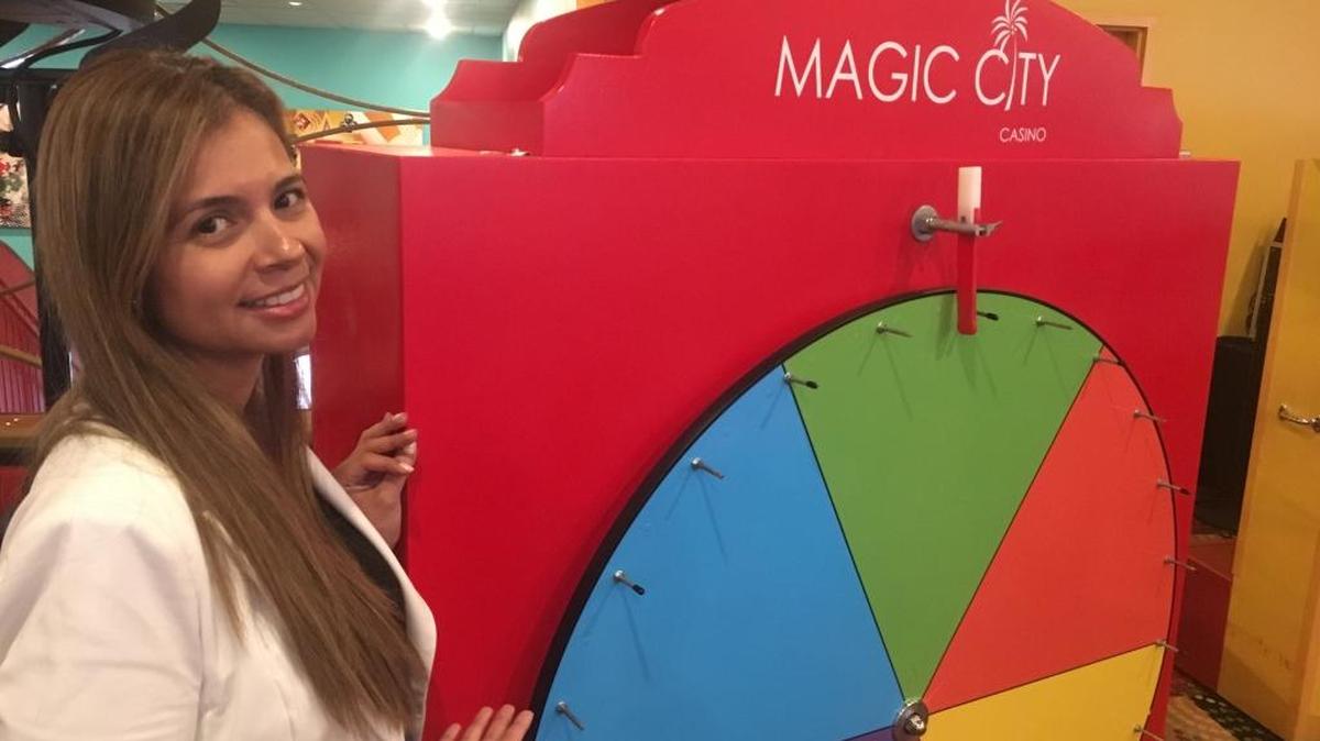 Magic City Casino’s Samhara Davila prepares to spin the color wheel as part of a new promotion.