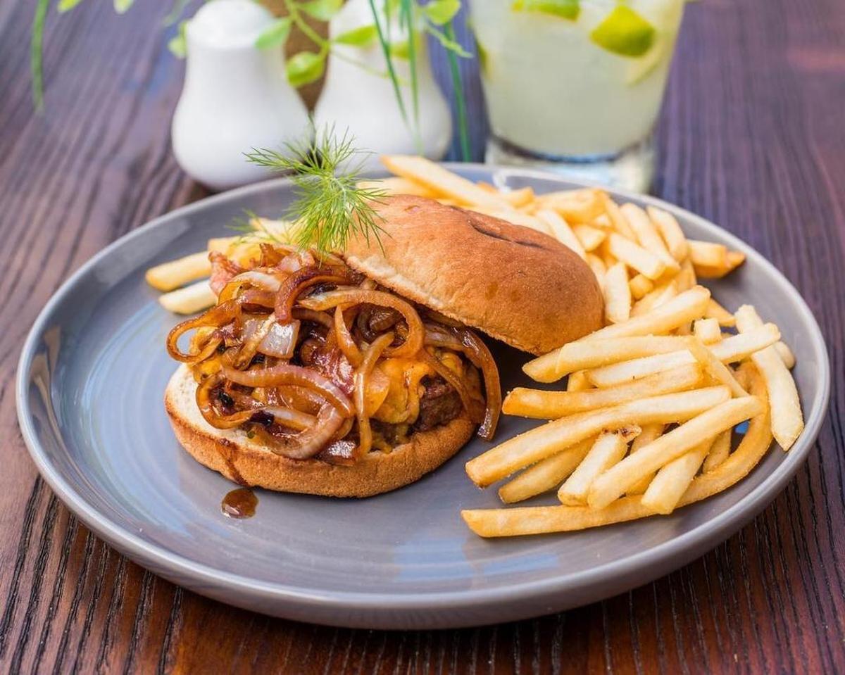 House burger with caramelized onions, cheddar and bacon at Bar Da Vila