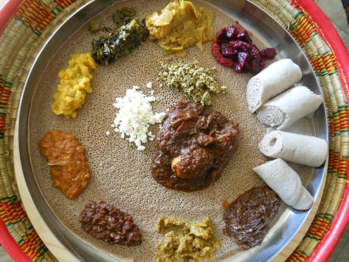Combination injera platter with wats.