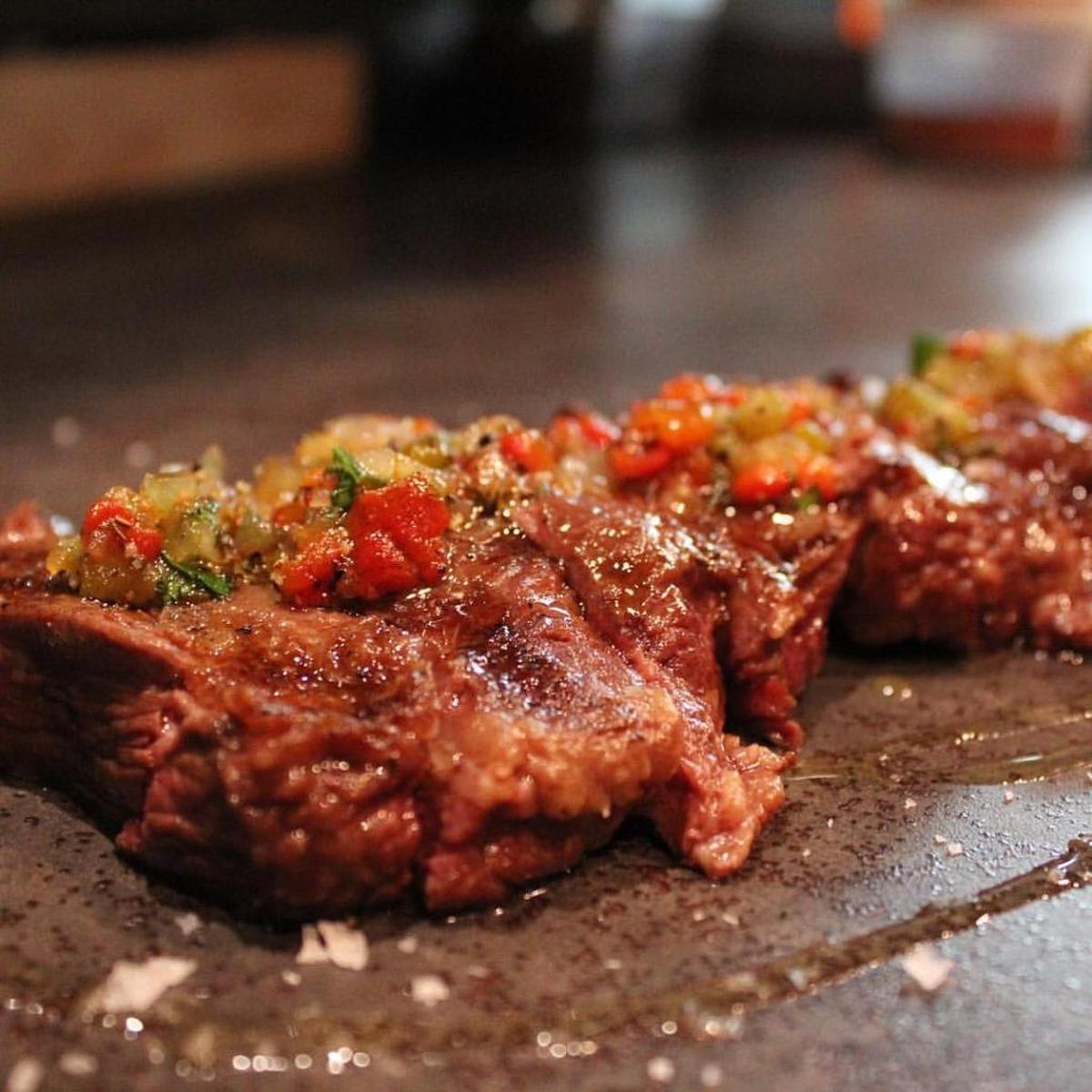 In Arson’s Josper oven, this Angus grass-fed skirt steak with a red-pepper brightened chimichurri is cooked a perfect medium rare.