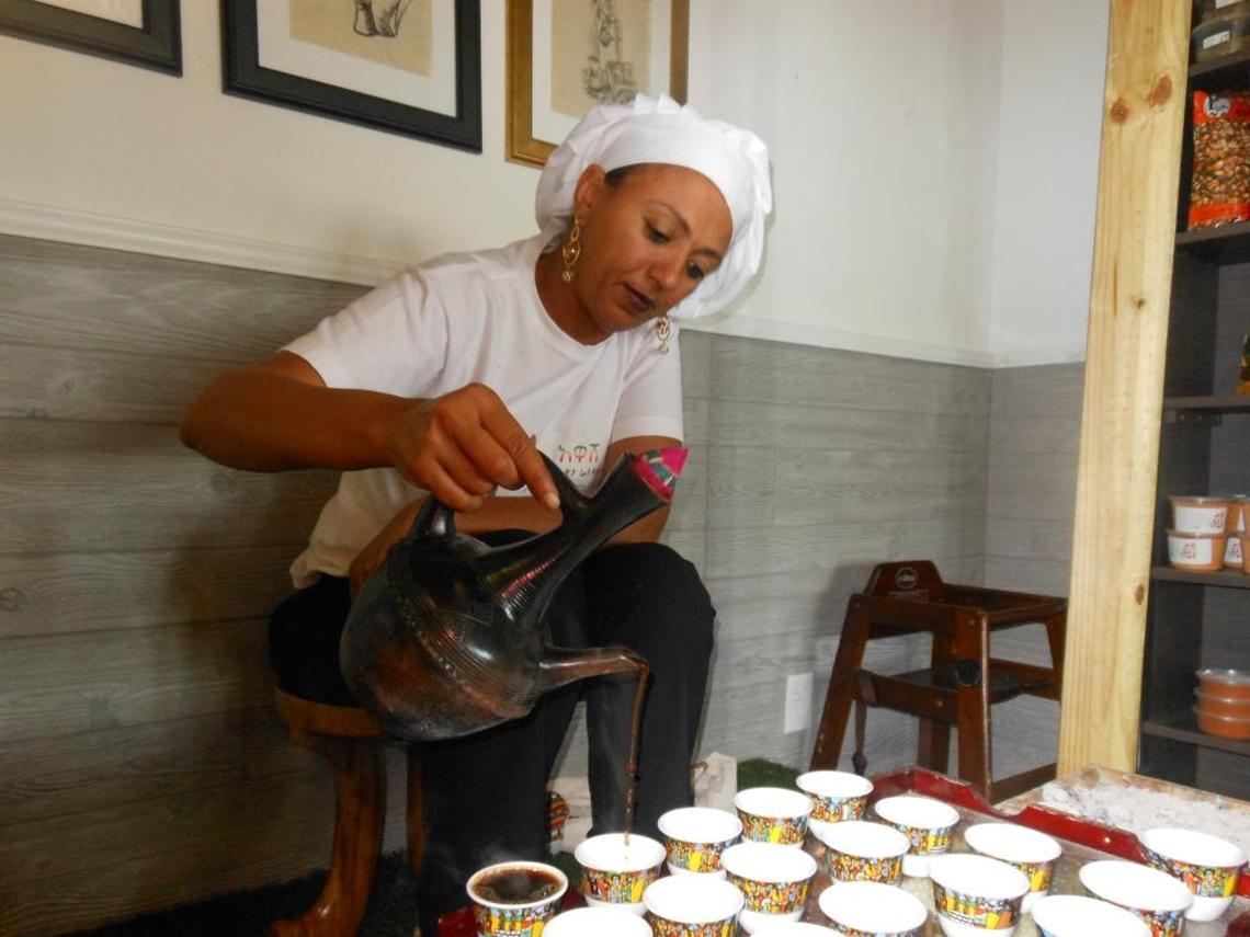 Coffee ceremony is demonstrated by Eka Wassel.