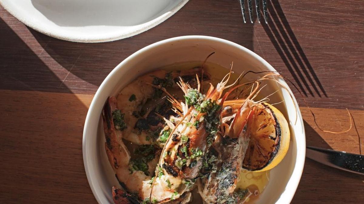 The excellent wood-fired Florida prawns are one of the few local seafood items on Upland Miami’s vast menu.