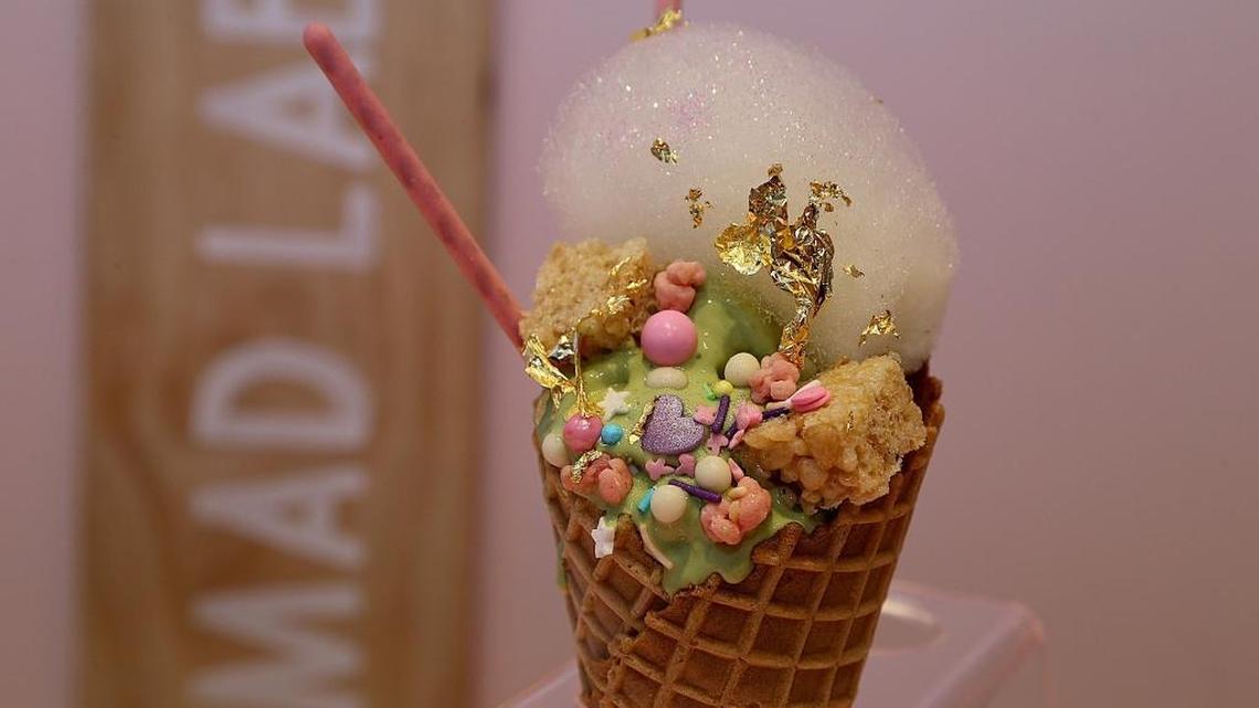 “Fancy Tropical” Passion fruit coconut swirl, edible gold, fancy sprinkles, maracuya bobba, fizzy and piña colada cotton candy at MadLab Creamery owned by Soraya Kilgore in the Design District’s Palm Court, serving gourmet soft serve, Japanese cheesecake, and house-made chocolate bark. Friday, Feb. 2, 2018.