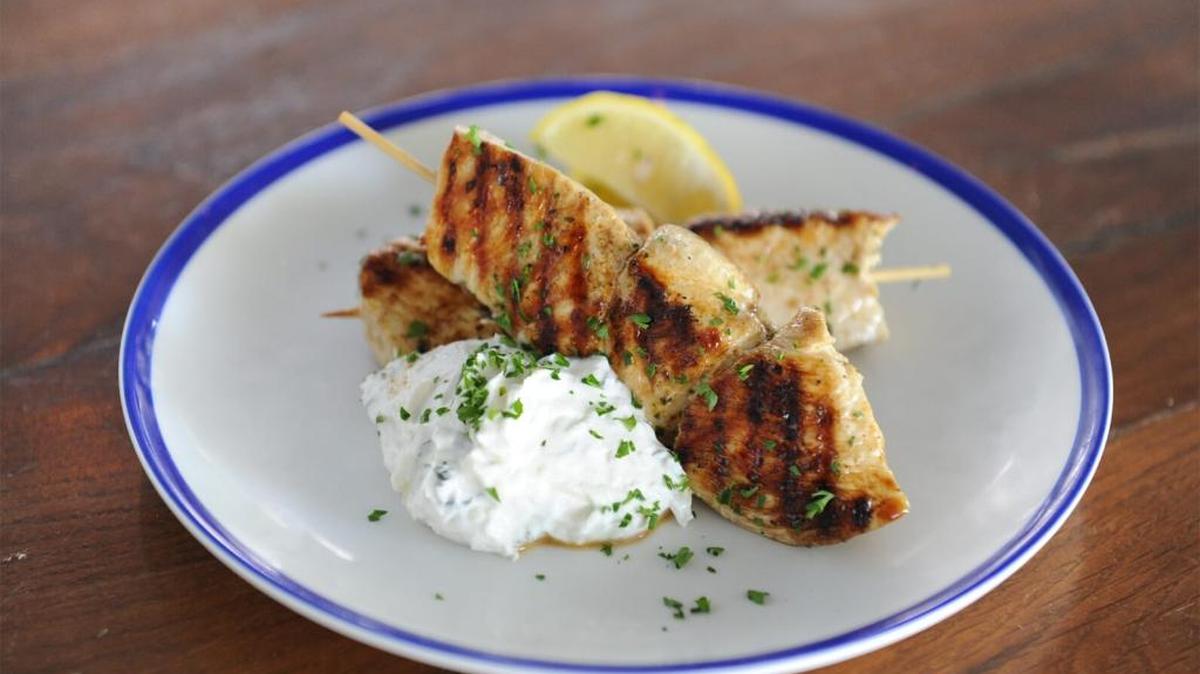 Chicken souvlaki skewers at Kiki on the River were served hot and curling with steam, the rich tzatsiki and ladolemeno sauces spot on.