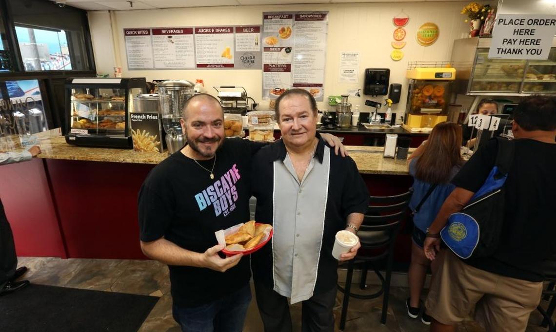 Eddy Lirio with his dad, Manolo, at Manolo and Rene café’s new downtown location, at 281 NE 1st St., where it’s not just a counter anymore. A full kitchen and a large dining room mean table service and an expanded menu. Though Manolo Lirio says he hopes to move back to the restaurant’s original corner location after the renovation of the building, whcih was heavily damaged by Hurricane Irma in September.
