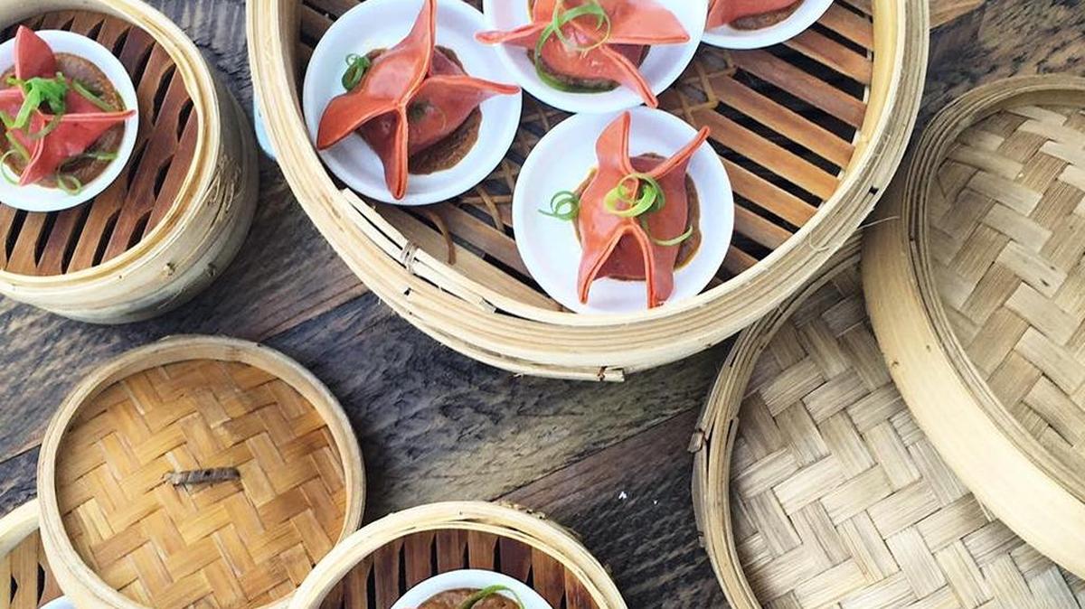 The short rib dumplings are stuffed with savory pulled meat and a creamy base.