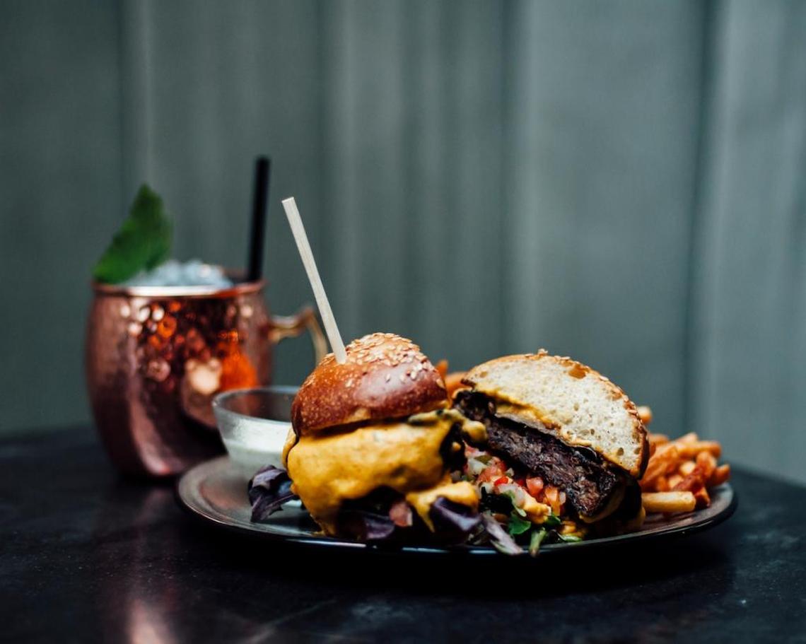 The burger at Planta is a hefty patty made of black beans, mashed lentils and beetroot.