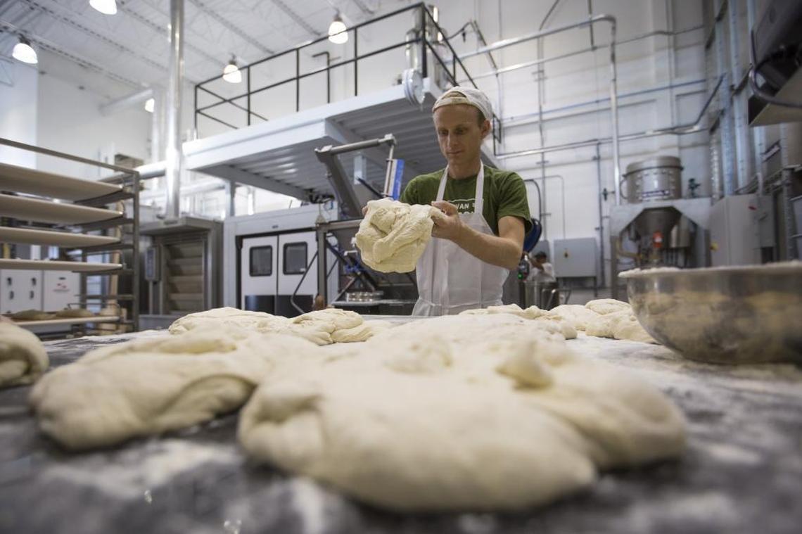 Matthieu Bettant, 35, head baker, cuts and shapes all the bread at Sullivan Street Bakery by hand. He worked with James Beard Award winning baker Jim Lahey to perfect this receipe, which has become a New York City favorite and is available at more than 250 restaurants there.