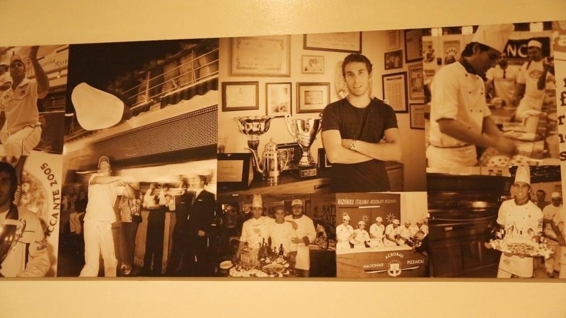 Photos of Renato Viola, an award-winning pizza chef in Italy, hang on the wall of Mister O-1 in Miami Beach where he is chef and co-owner. Viola gained entry into the United States under an O-1 visa for temporary workers, as an ‘individual who possesses extraordinary ability.’ He opened Mister O1 Extraordinary Pizza on Miami Beach, which became a huge hit despite being buried inside an office building with no sign out front. That has led to two other Mister O1 pizzerias, in Brickell and Wynwood.